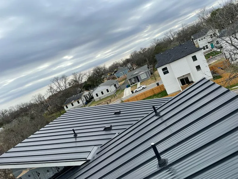 Standing seam metal roof panels with vents for Skylight Repair in Sparks